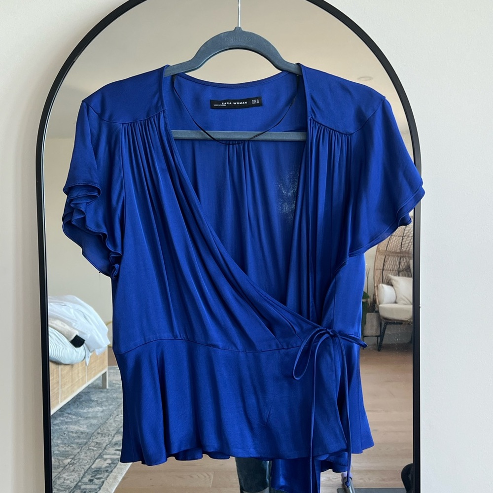 Silky blue wrap blouse